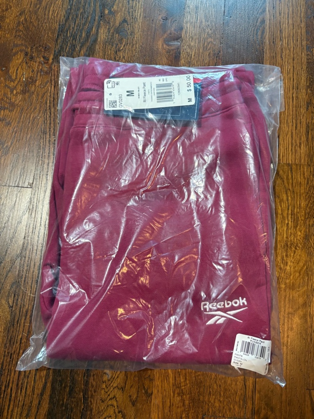 Reebok Fleece Pants with White Logo
Punch Berry
